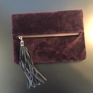 Dark purple velvet clutch with zipper & tassel